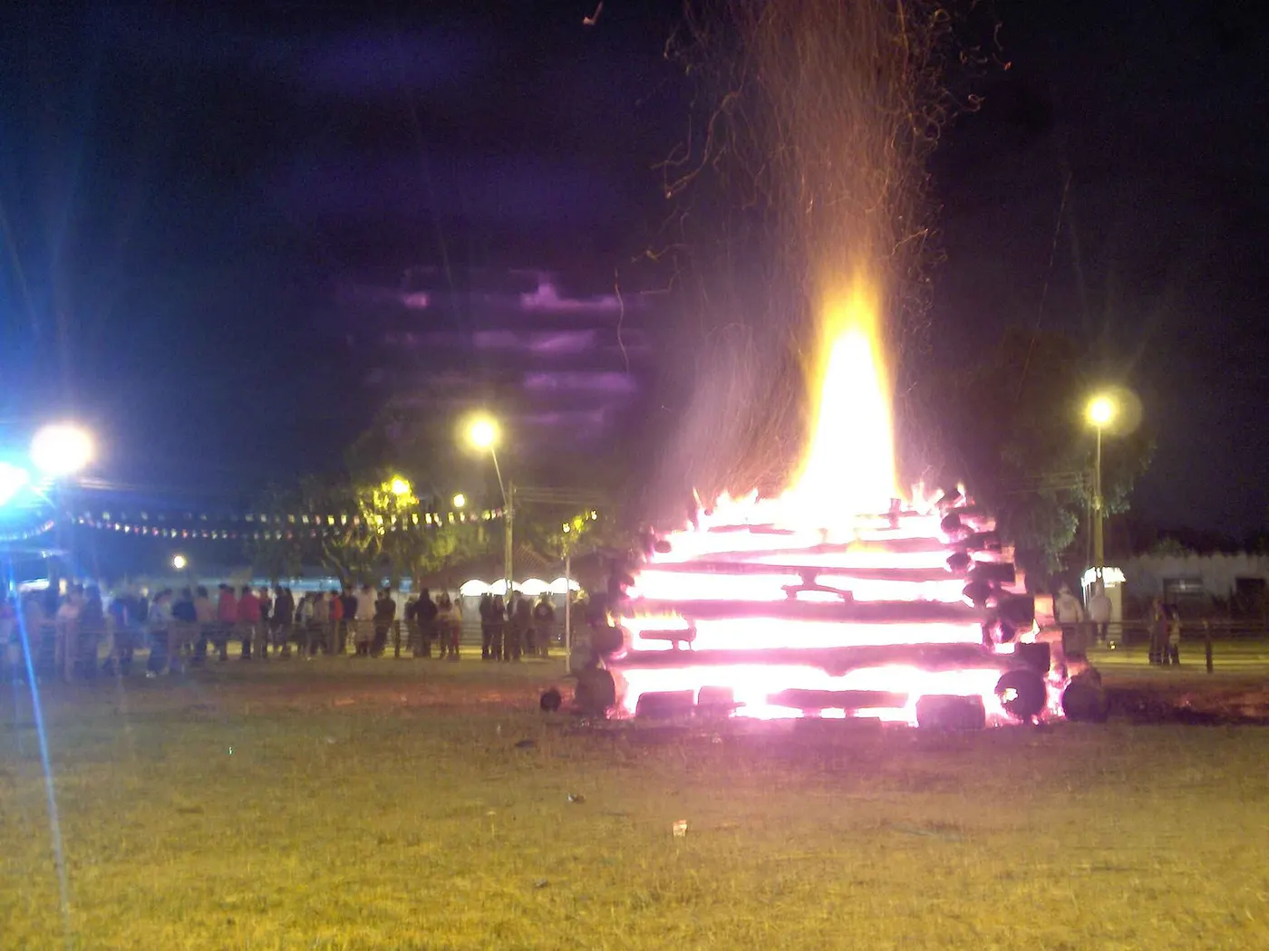 Colourful bunting and bonfire at a June Festa Junina celebration