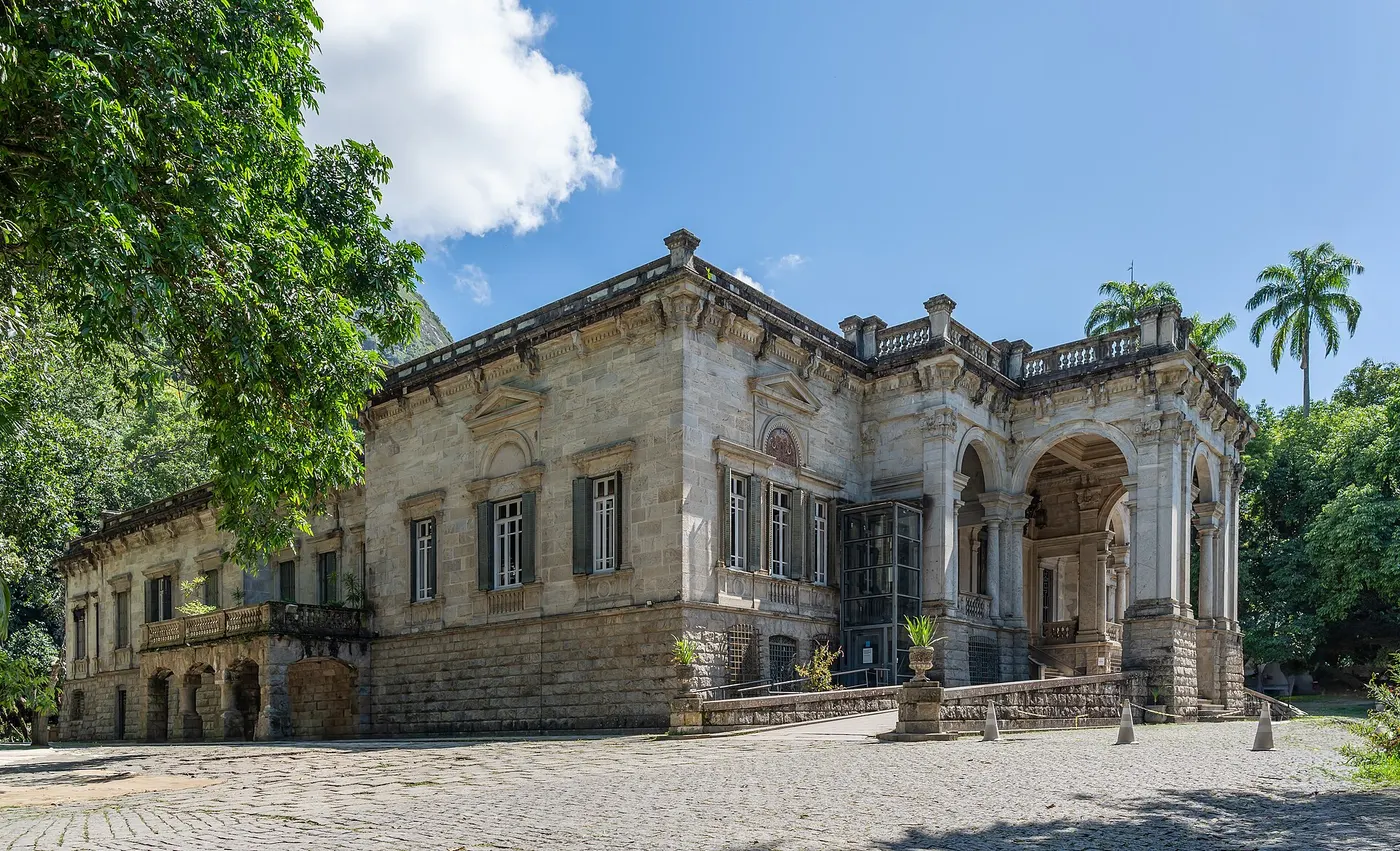 Parque Lage's mansion courtyard pool with Corcovado mountain rising behind