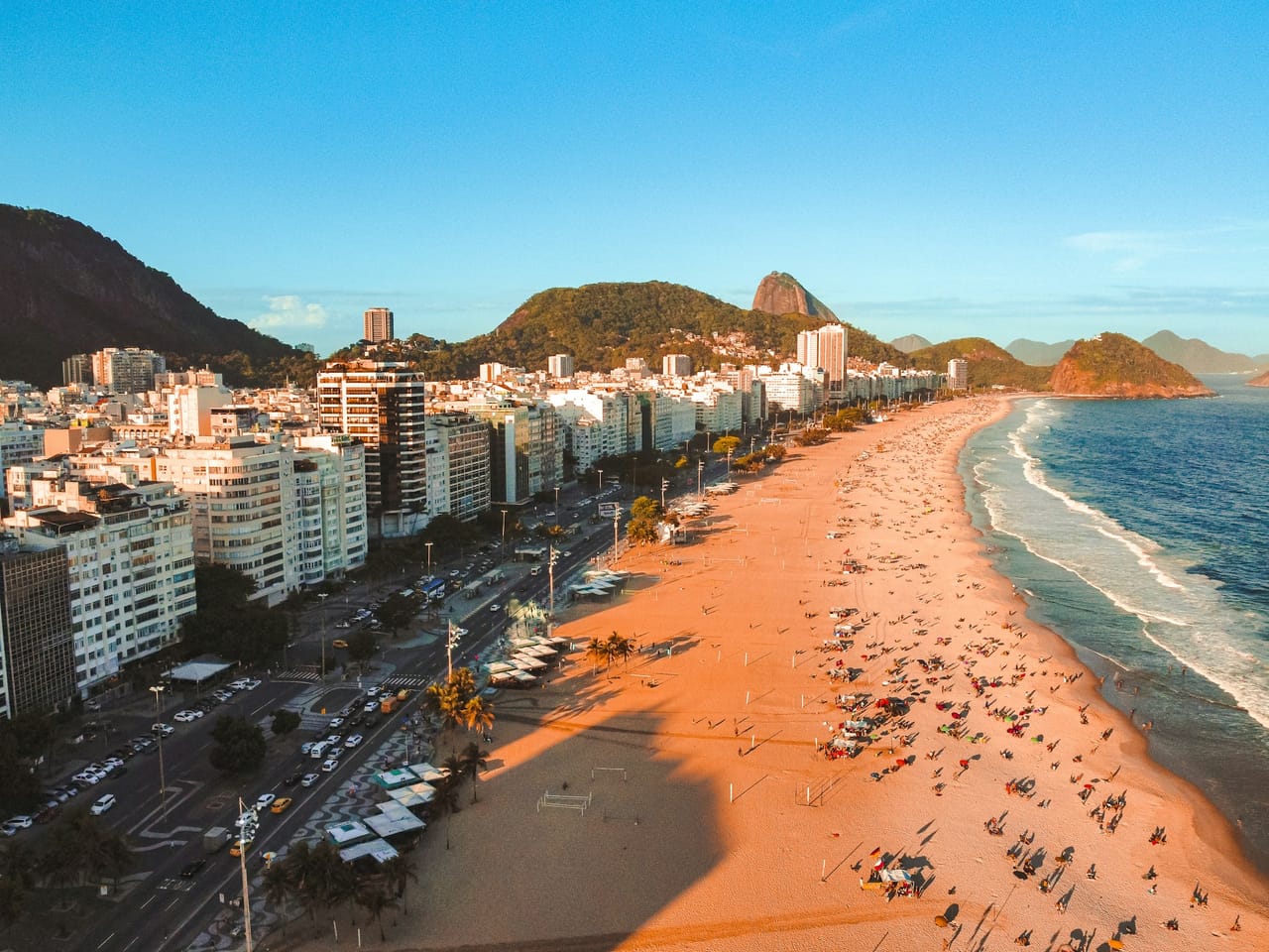 Aerial view of Copacabana beach and the Rio de Janeiro coastline at golden hour