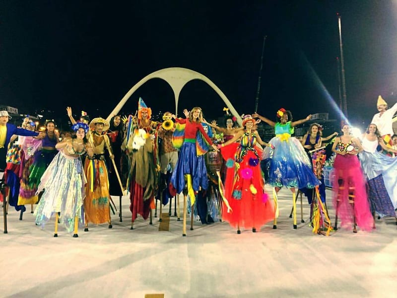 Costumed Carnival performers on stilts in Rio de Janeiro