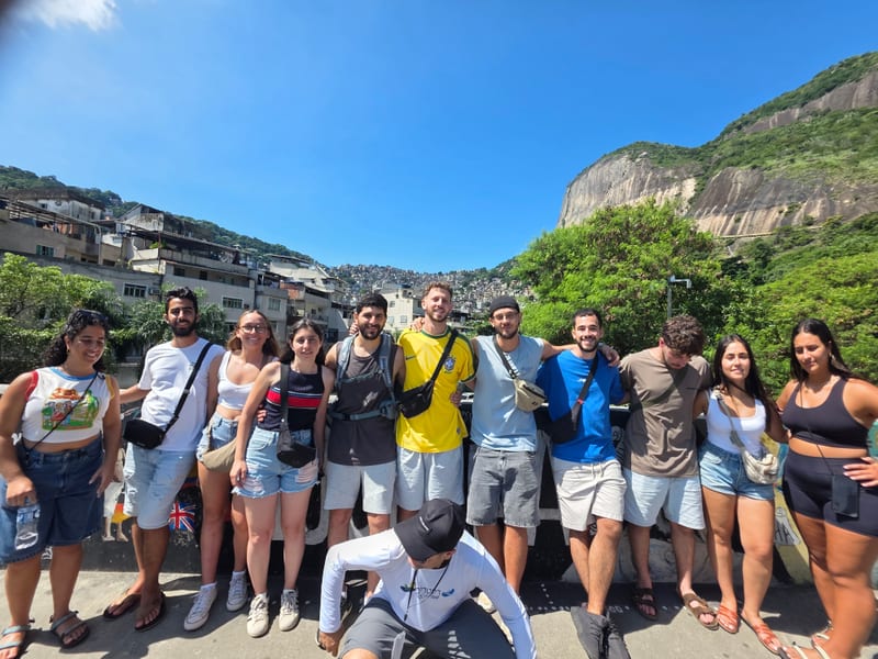 A tour group exploring a Rio de Janeiro hillside community