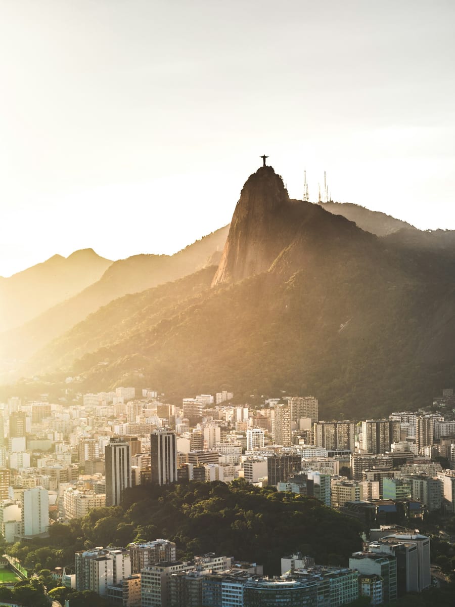 Christ the Redeemer statue above Rio de Janeiro at golden hour